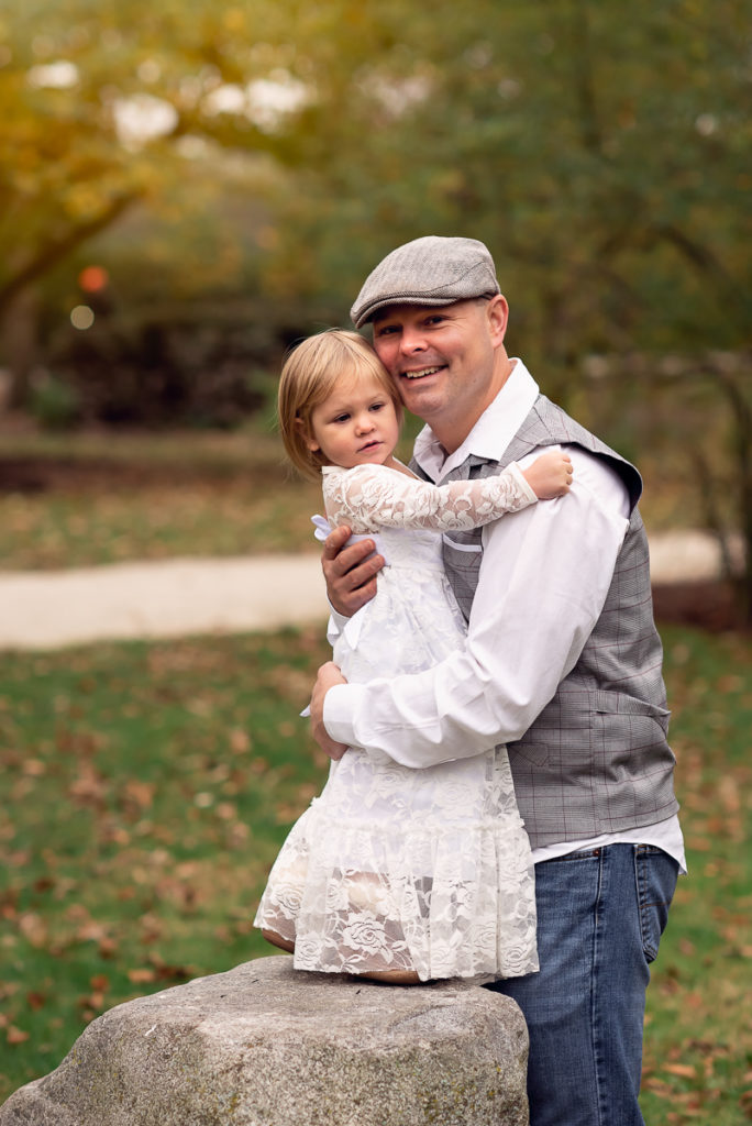 Family session for a father and his toddler daughter at Fabyan Forest Preserve in Geneva by family photographer Mila Craila Photography