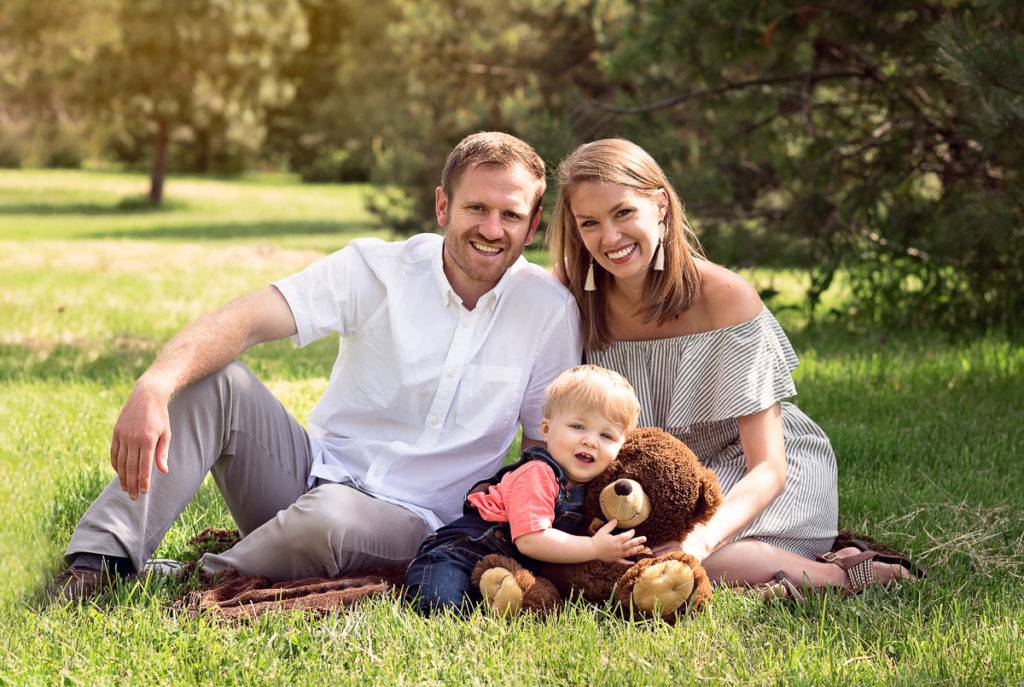 Family session for parents and a toddler son at Montrose Beach in the summer by family photographer Mila Craila Photography