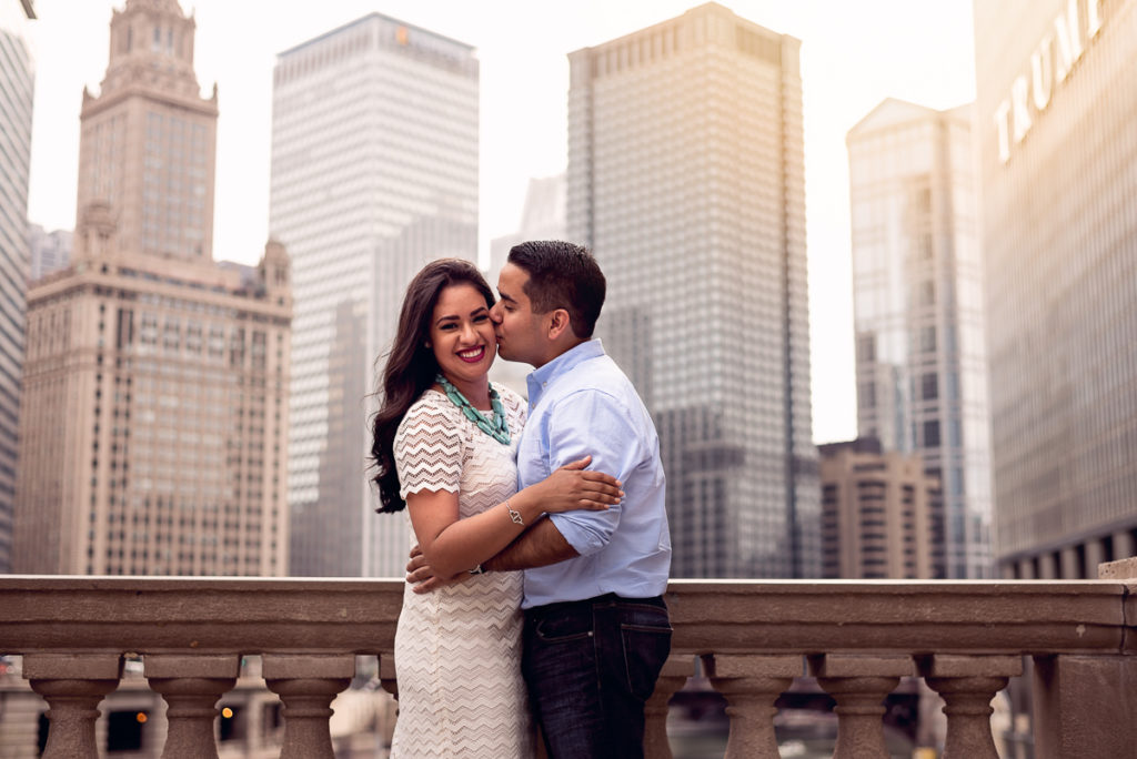 An engagement session for an engaged couple in downtown Chicago in the fall by a wedding photographer Mila Craila Photography