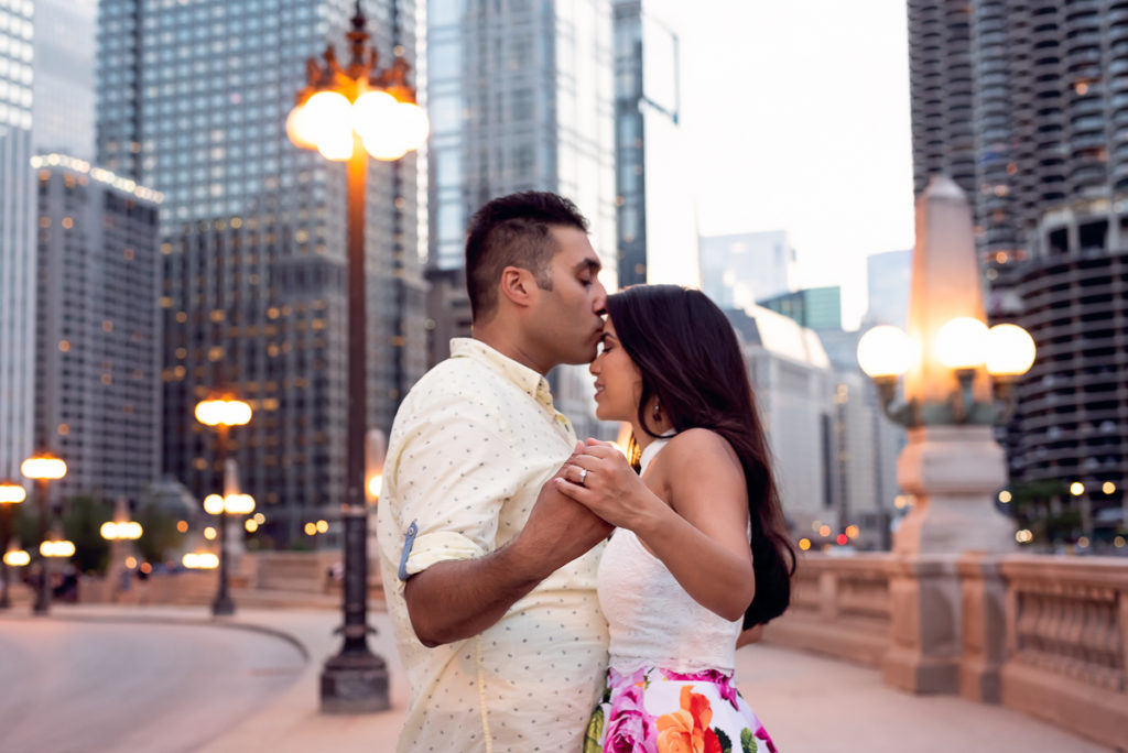 An engagement session for an engaged couple in downtown Chicago in the summer by a wedding photographer Mila Craila Photography