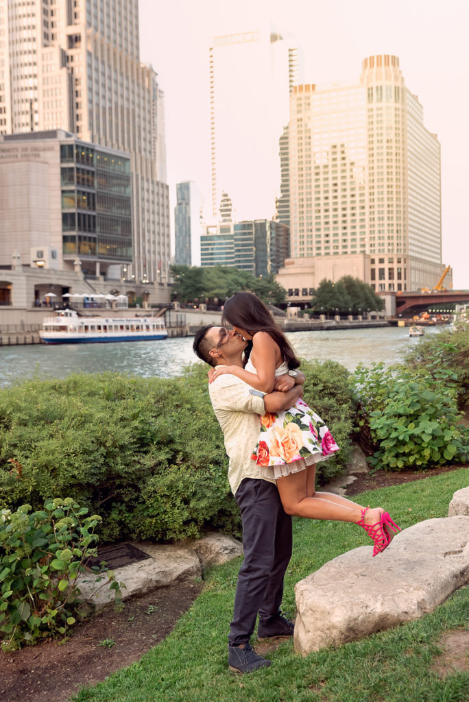 An engagement session for an engaged couple in downtown Chicago in the summer by a wedding photographer Mila Craila Photography