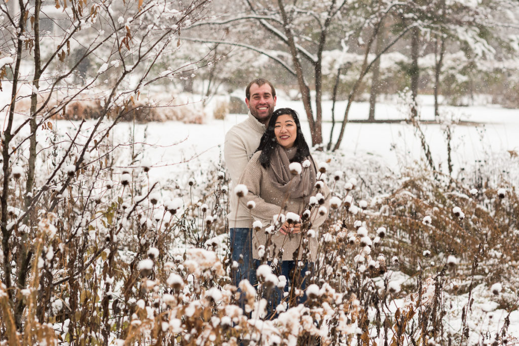 An engagement session for an engaged couple at Fabyan Forest Preserve in the winter by a wedding photographer Mila Craila Photography