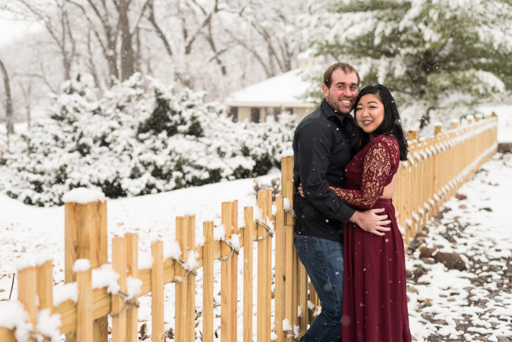 An engagement session for an engaged couple at Fabyan Forest Preserve in the winter by a wedding photographer Mila Craila Photography