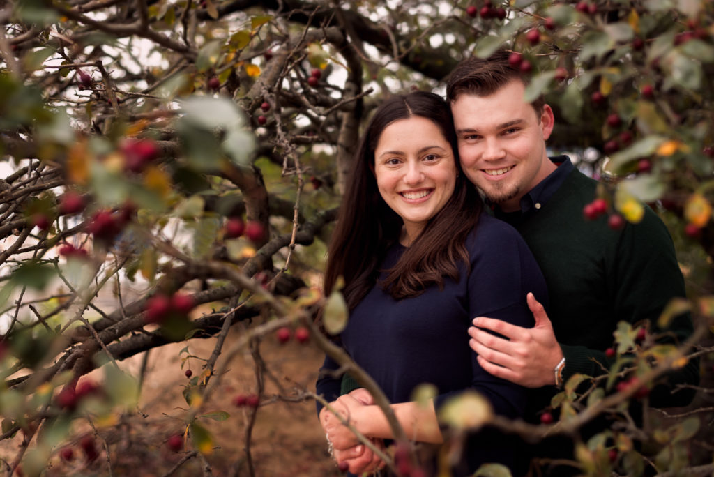 An engagement session for an engaged couple on North Avenue Beach in Chicago in the fall by a wedding photographer Mila Craila Photography