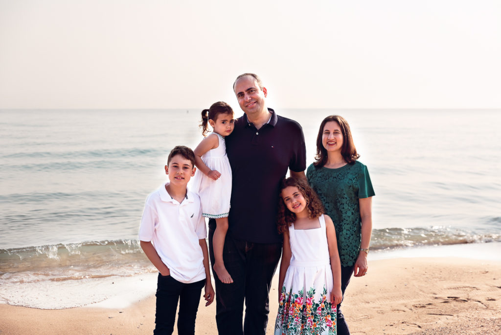 Family session for a family of five on the beach at Gillson Park in Wilmette by family photographer Mila Craila Photography