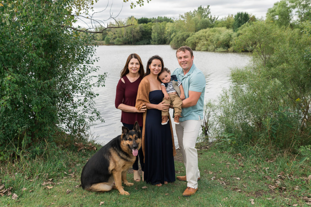 Family session for parents and a toddler son and a dog at SongBird Slough Forest Preserve in Itasca by family photographer Mila Craila Photography