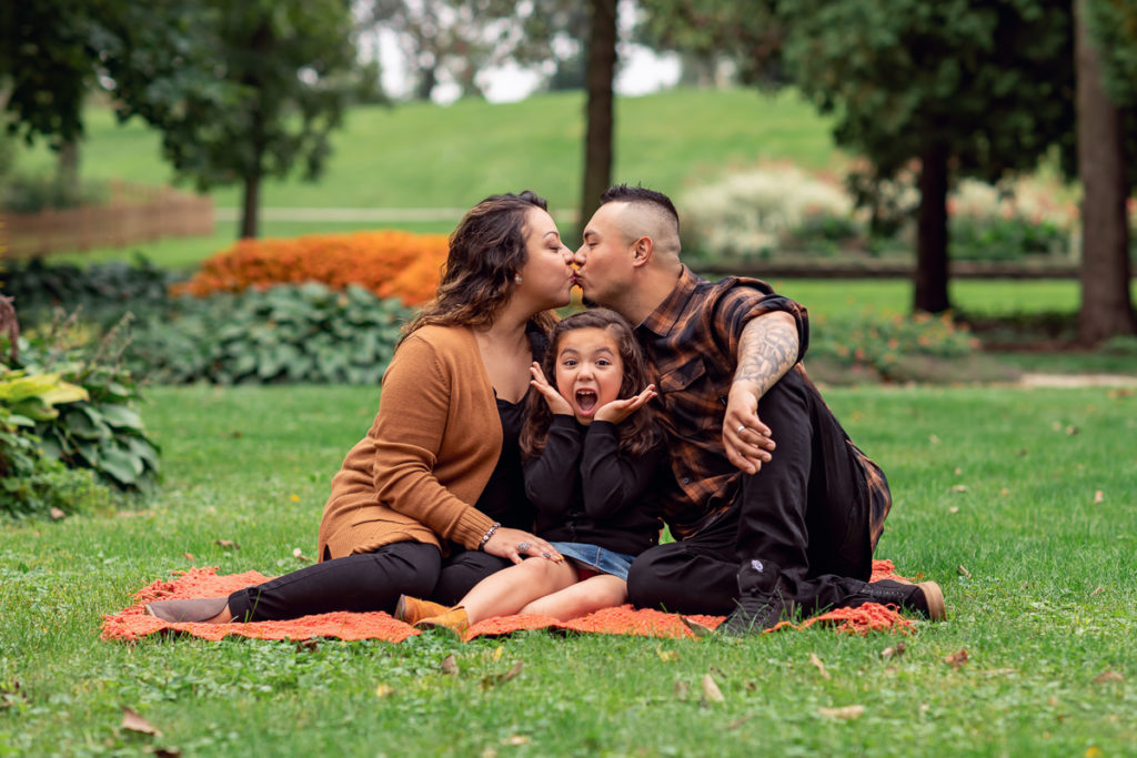 Family session for parents and a young daughter at Fabyan Forest Preserve in Geneva in the fall by family photographer Mila Craila Photography