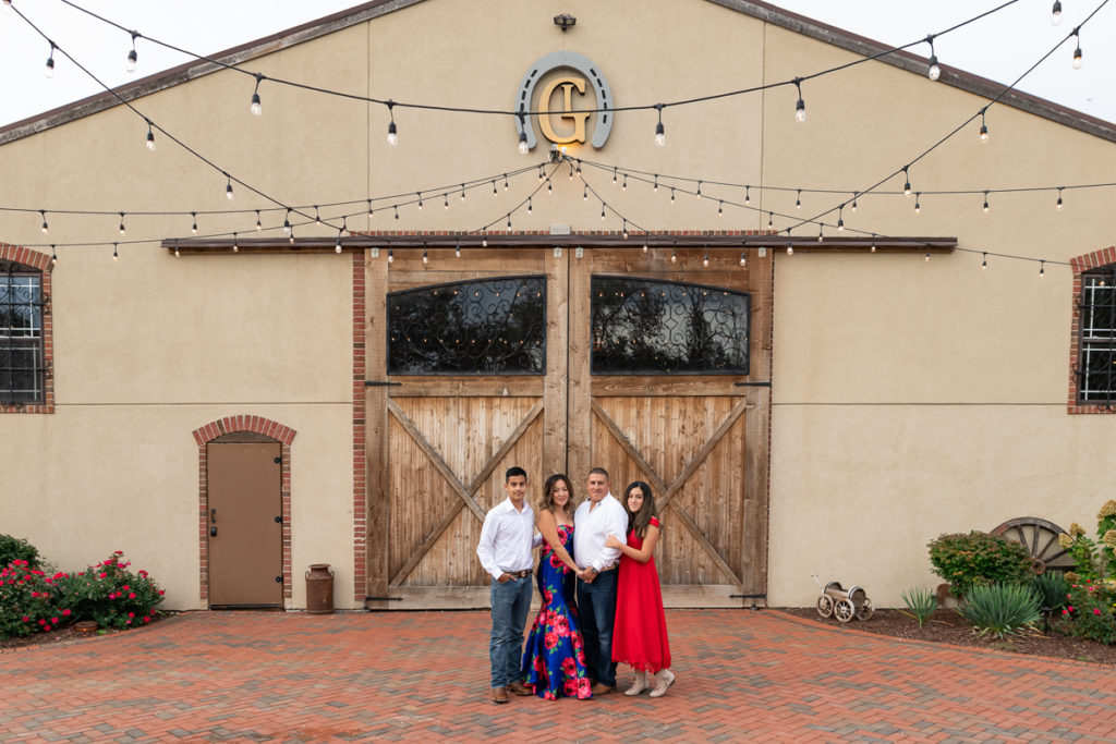 Family session for parents and teenage kids at Rancho Los Guzman in Joliet in the fall by family photographer Mila Craila Photography