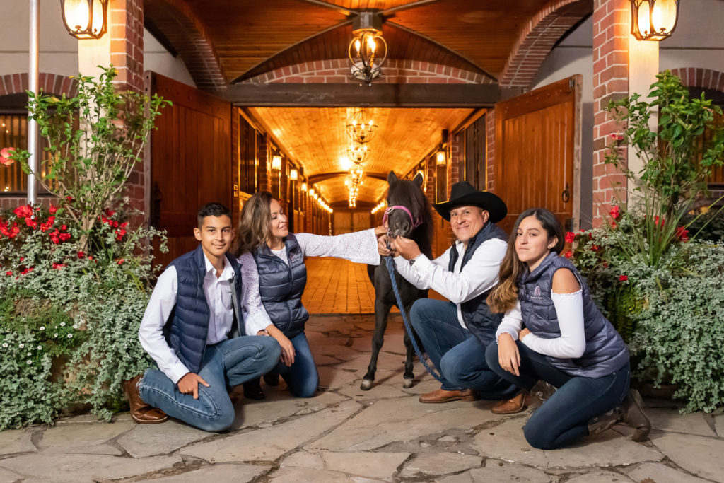 Family session for parents and teenage kids and a pony horse at Rancho Los Guzman in Joliet in the fall by family photographer Mila Craila Photography