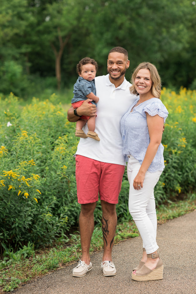 Family session for parents and a toddler son at Fabyan Forest Preserve in Geneva in the summer during rain by family photographer Mila Craila Photography