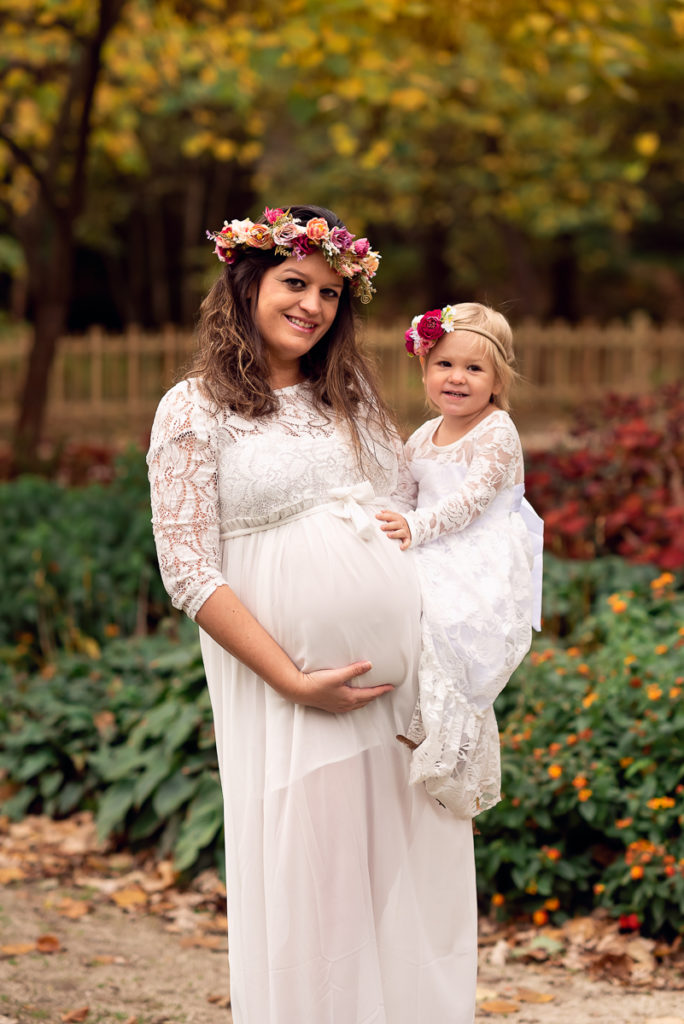 Family session for a pregnant mother and her toddler daughter at Fabyan Forest Preserve in Geneva by family photographer Mila Craila Photography