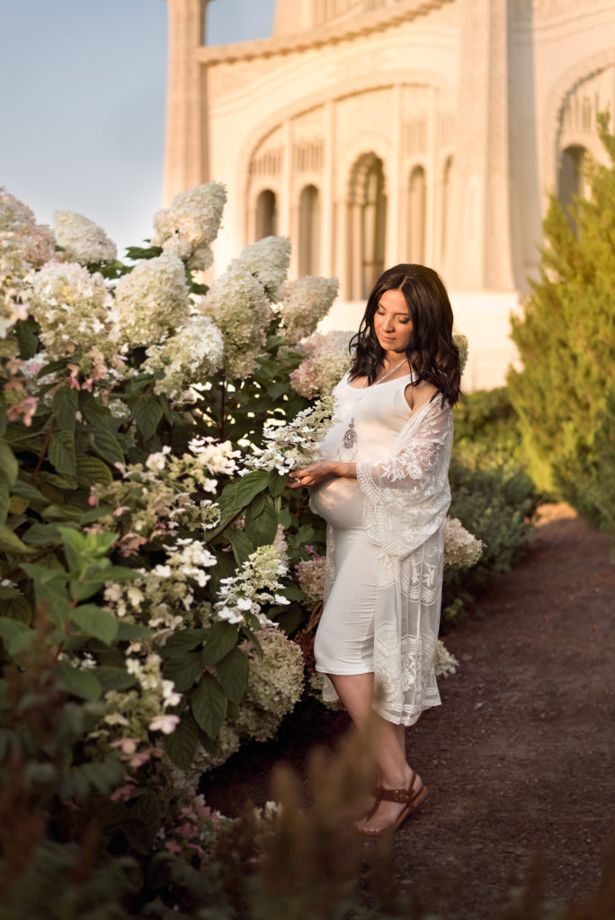 a pregnant woman at the Bahai Temple in Wilmette by Mila Craila Photography